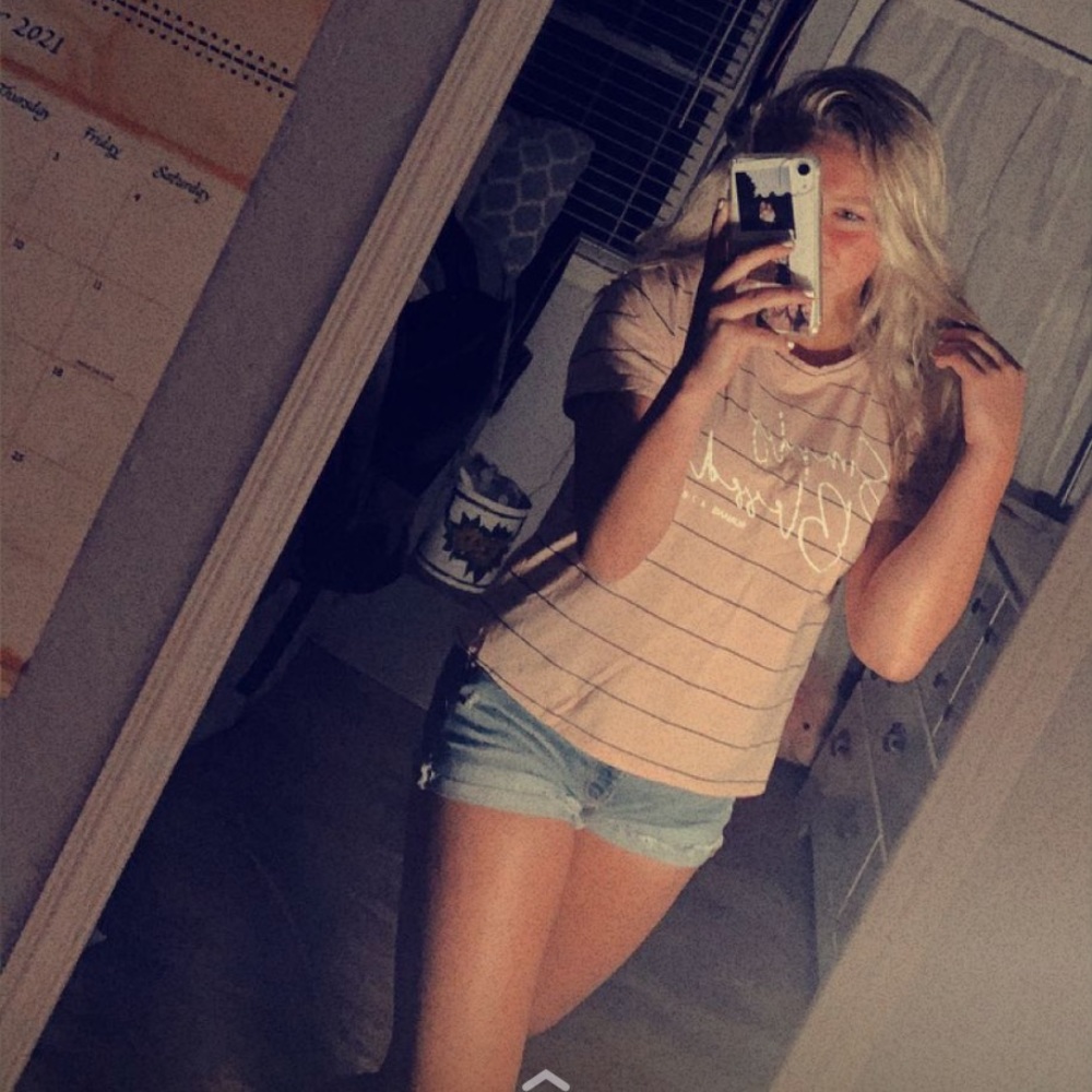 Pinkish/tan T with black stripes